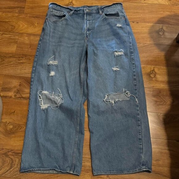 Men's Blue Jeans High-waisted, wide-leg, distressed denim jeans - Picture 1 of 3